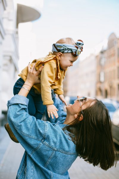 mother-carrying-her-daughter-3662773 mother-carrying-her-daughter-3662773